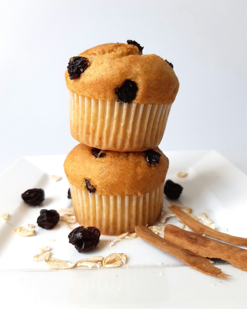 three muffins stacked on top of each other on a plate