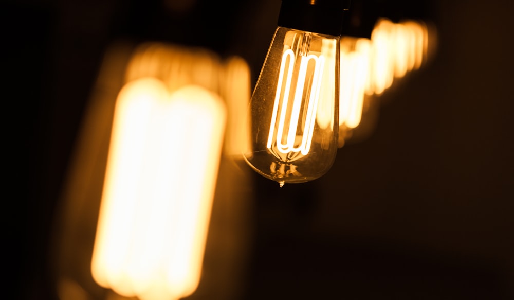 a group of light bulbs hanging from a ceiling