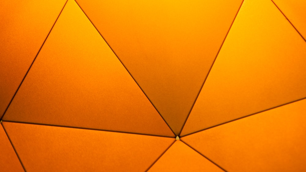 a close up view of a yellow umbrella