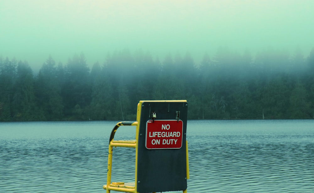 a lifeguard stand in the middle of a body of water