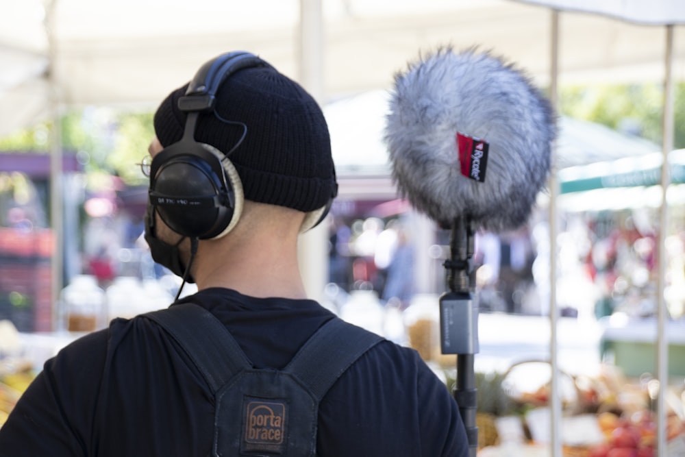 a man wearing headphones and a microphone