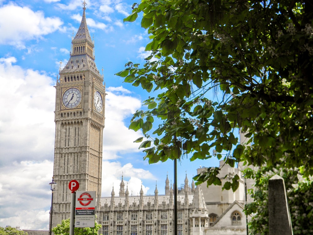 a large clock tower towering over a city