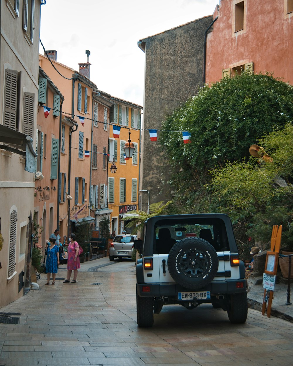 a jeep parked on the side of a street