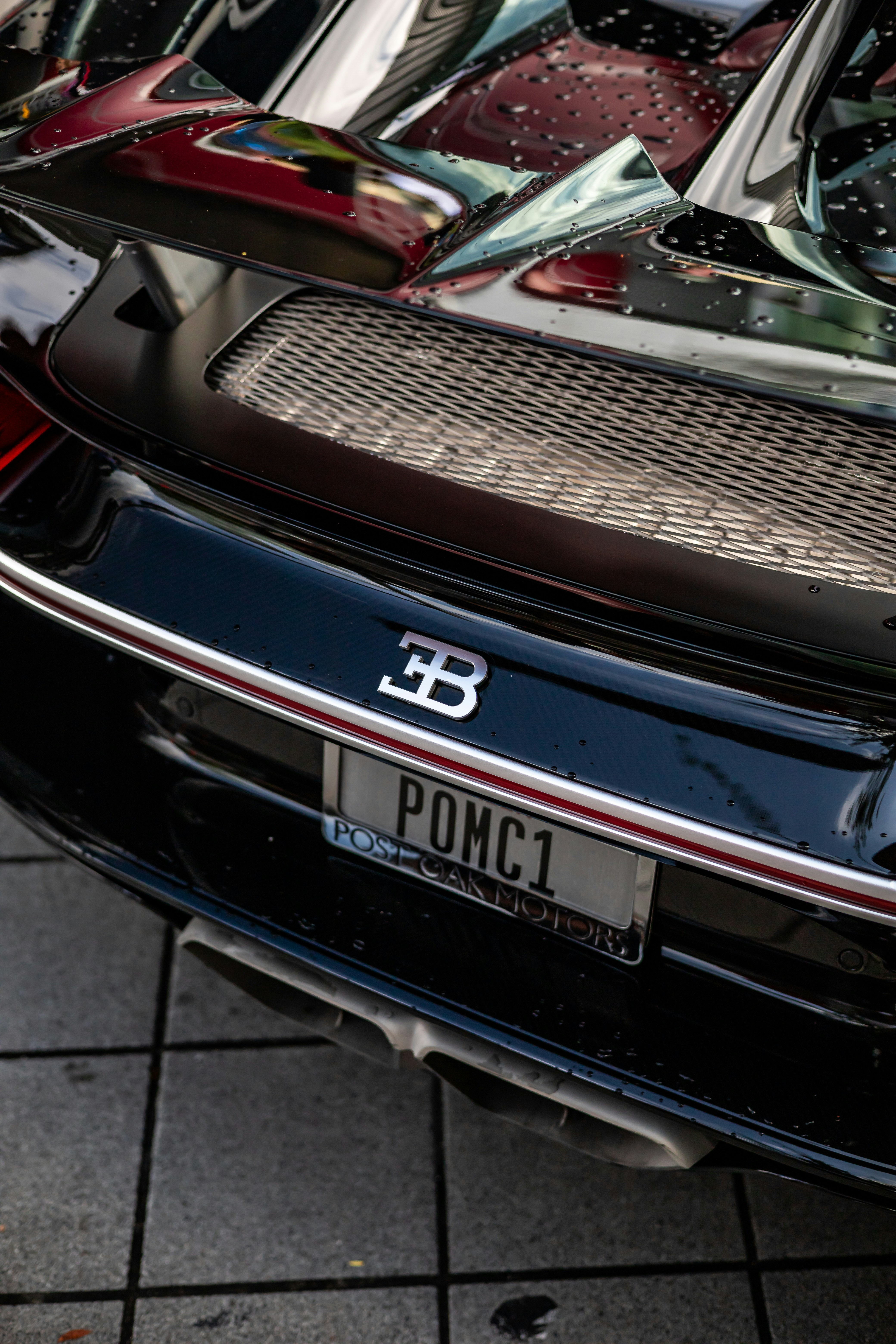 The back end of a black sports car photo – Free Art Image on Unsplash