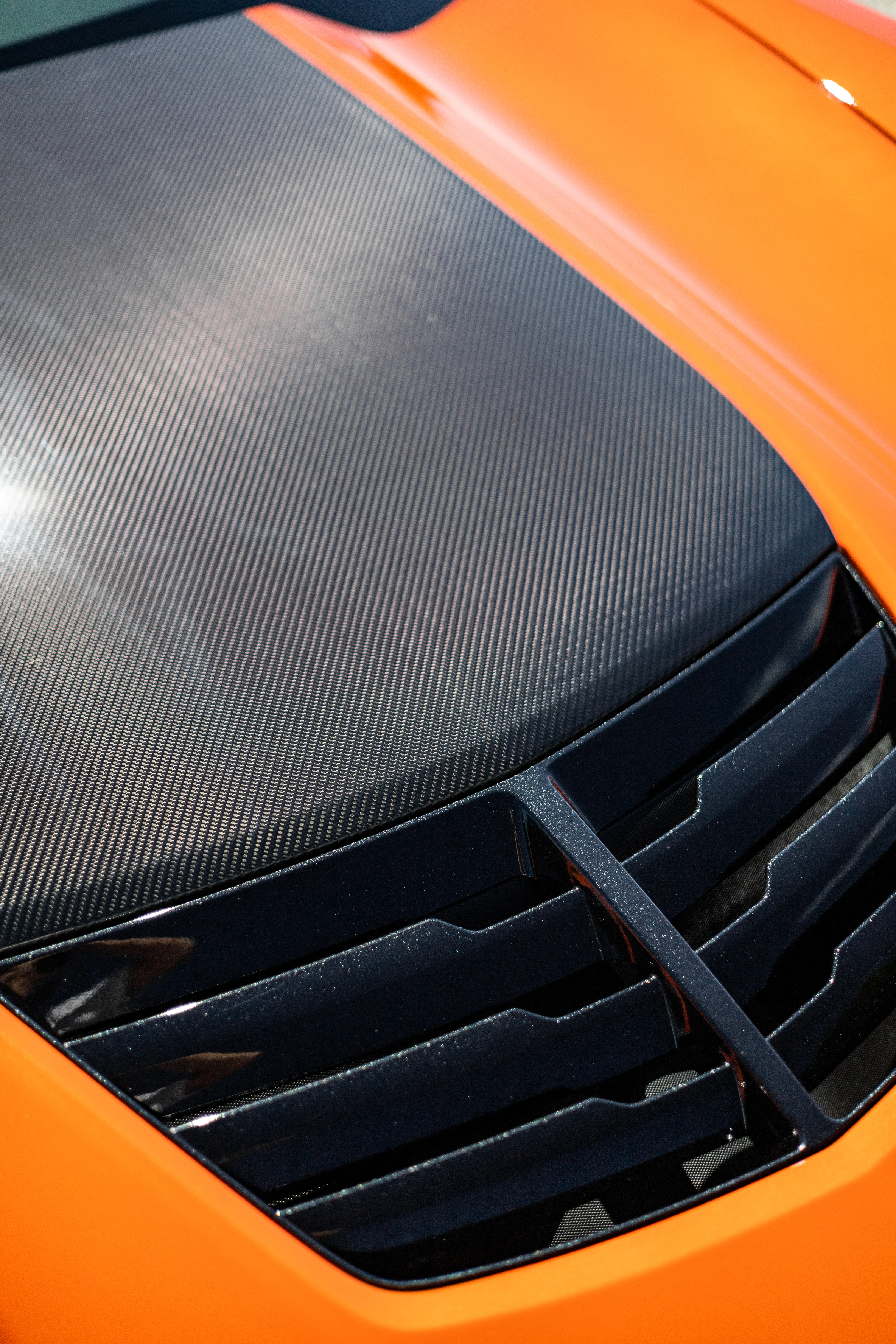 Carbon fiber hood wrap installed at DrivenMN Burnsville MN