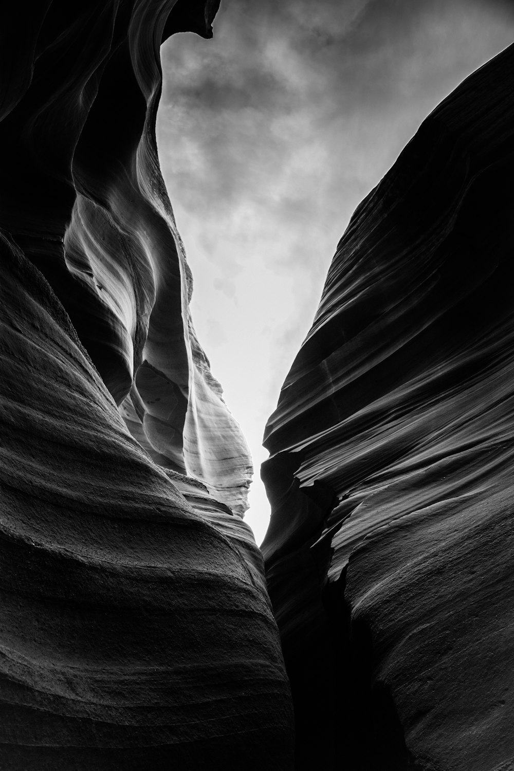 a black and white photo of a canyon