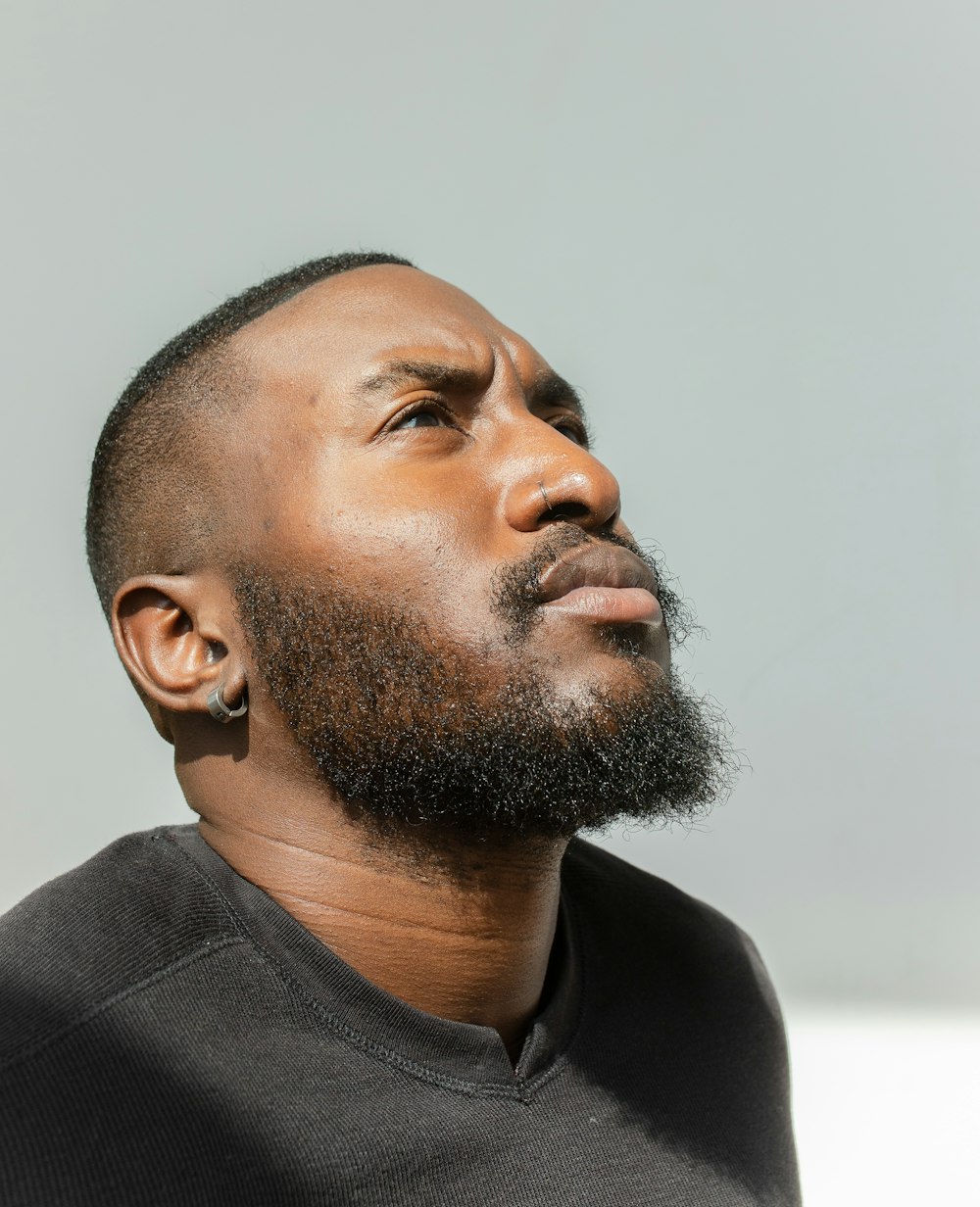 a close up of a person with a beard