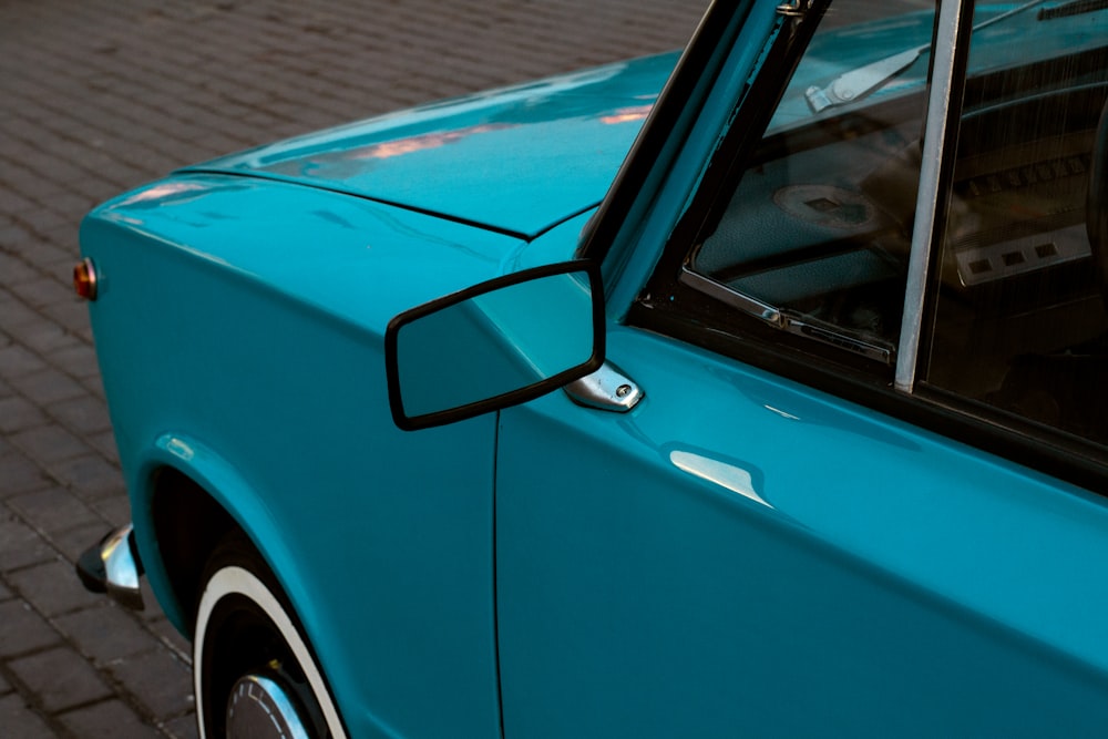 a close up of a car's side view mirror