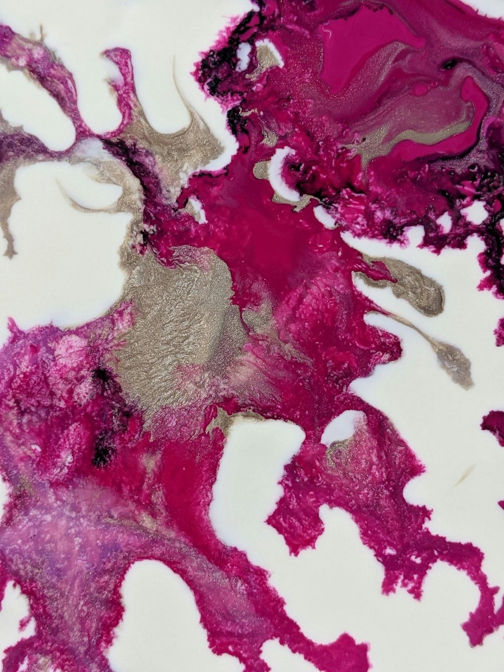 a close up of a white and purple substance