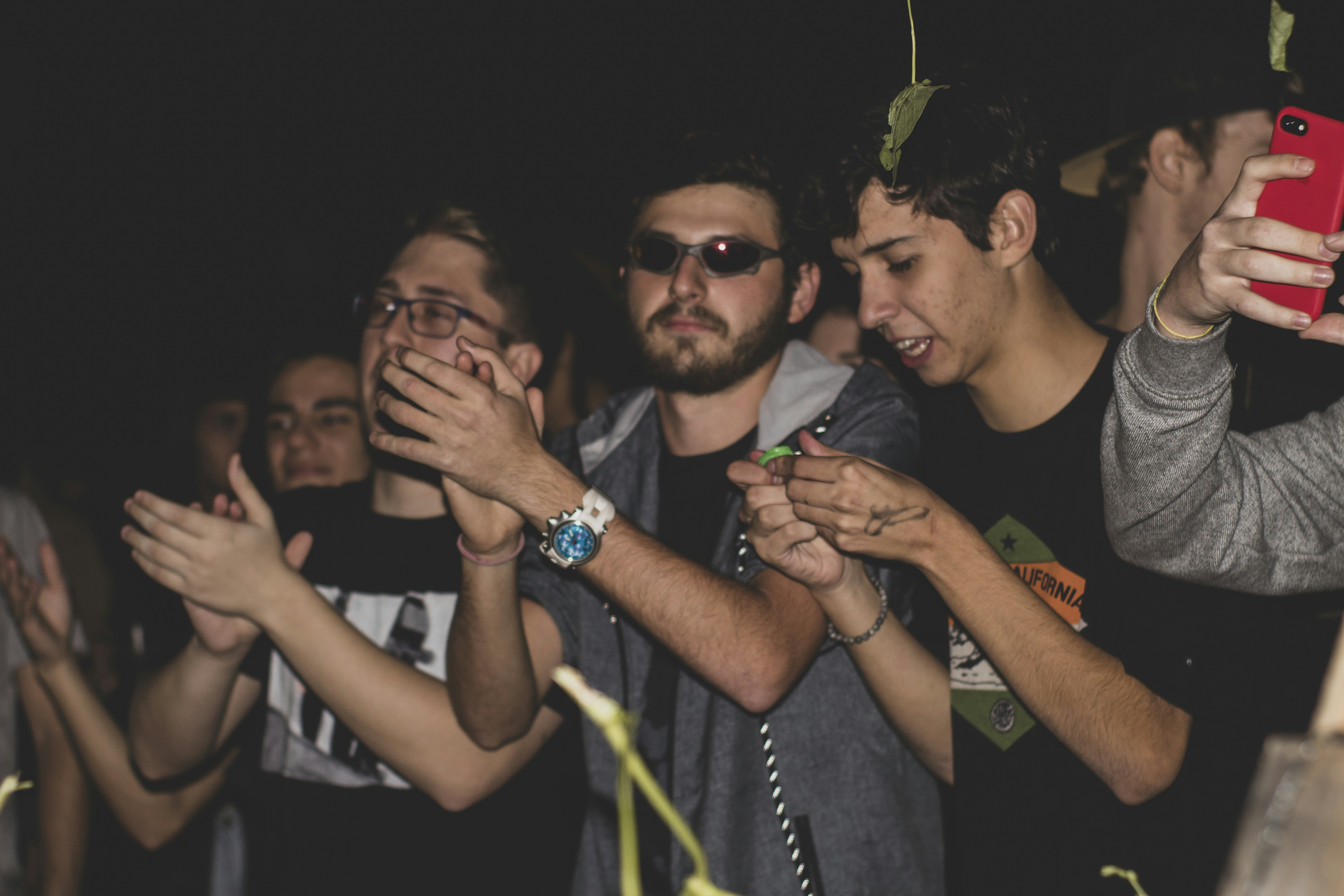 a group of people standing next to each other