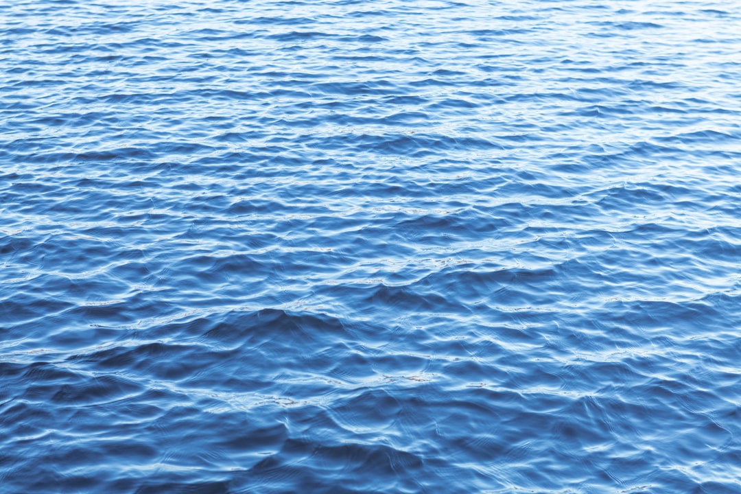 A large body of water that is very blue