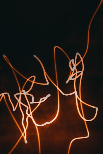 a blurry photo of a person with a cell phone