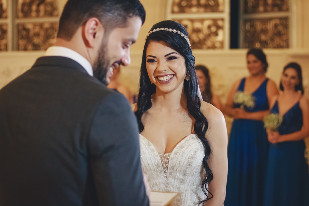 a man and a woman standing next to each other