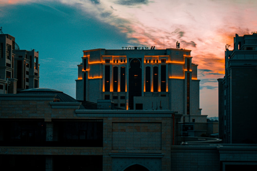 a view of a building at sunset from a rooftop