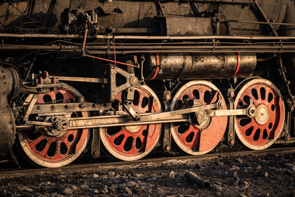 a close up of the wheels of a train