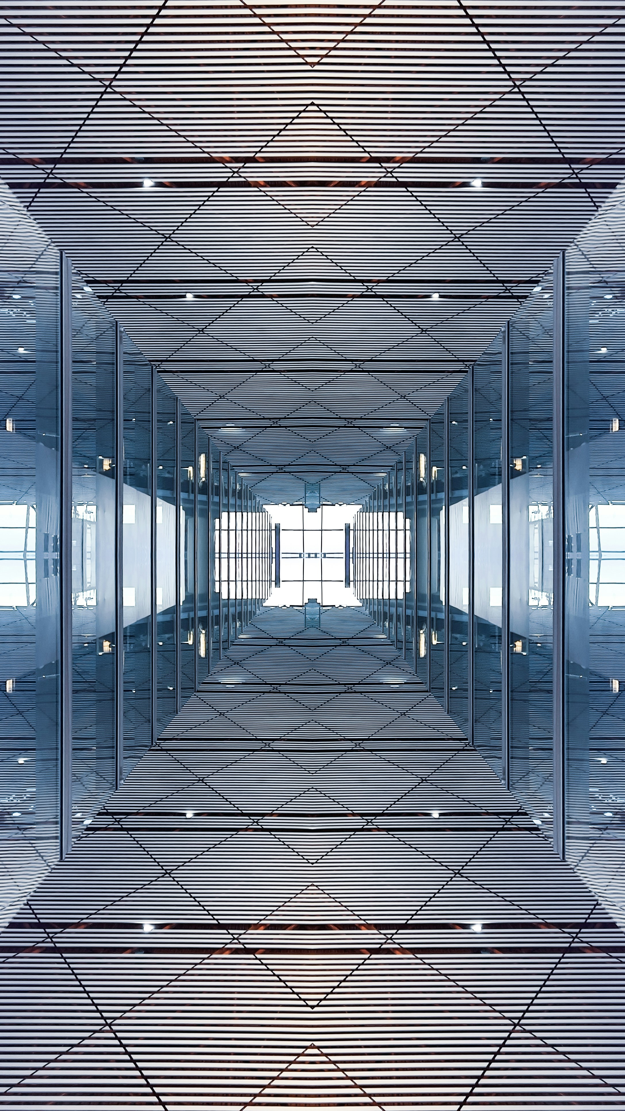 a very large room with some mirrors in it