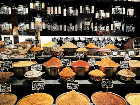 a variety of spices on display in a store