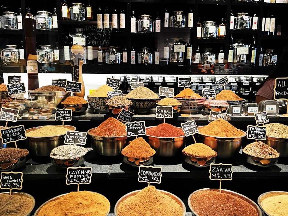 a variety of spices on display in a store