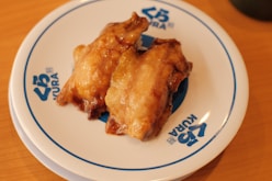 two pieces of fried food on a plate