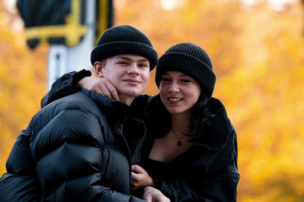 a man and a woman standing next to each other