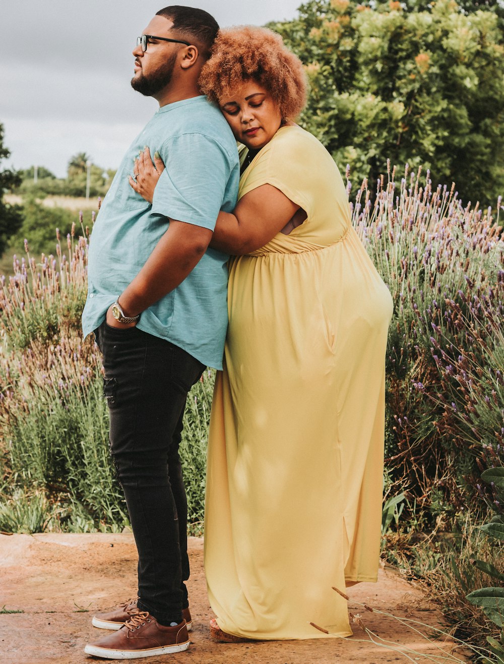 a man and a woman standing next to each other