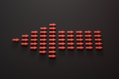 Minimalist graphic showing upward arrows symbolizing business growth.