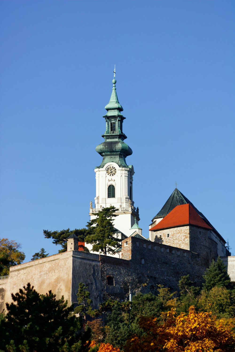 a tall tower with a clock on top of it