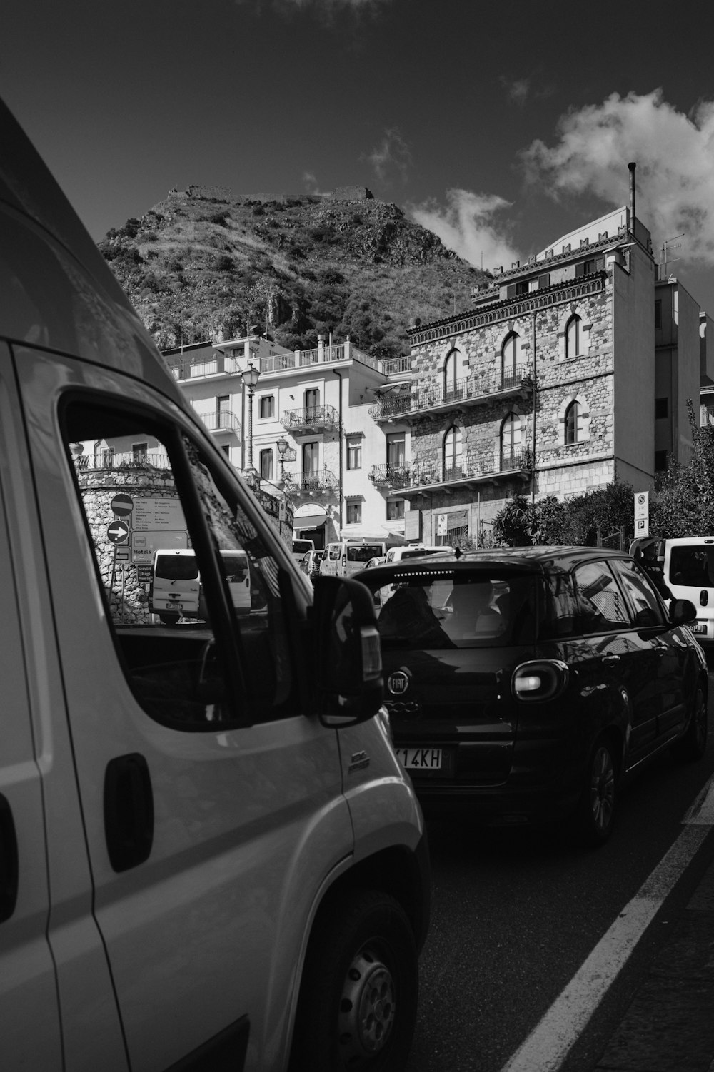 a black and white photo of a city street