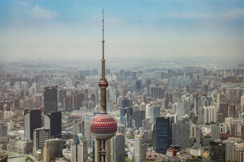 Chinese apartment buildings, Shanghai skyline, Beijing residential towers, construction cranes, empty apartments