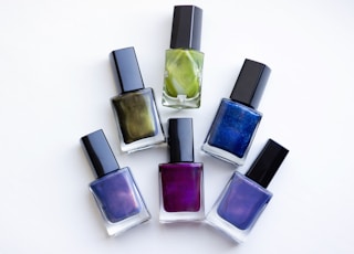 Colorful glass bottles with nail polish.