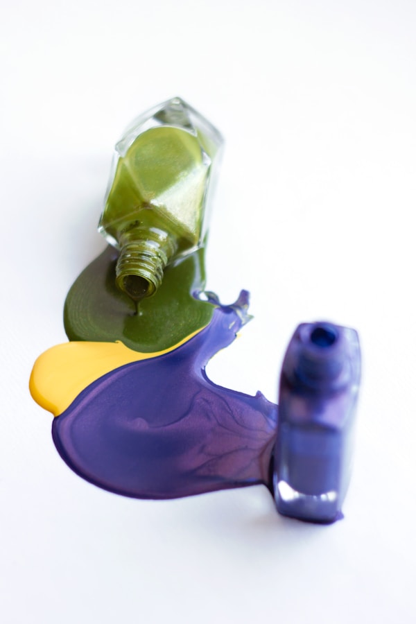 Pouring green nail laquer with yellow and purple spilled out nail polish.
If you like my work and want to support my passion for photography, there is an option to buy a coffee (paypal link in profile). Thank you!by Maria Lupan