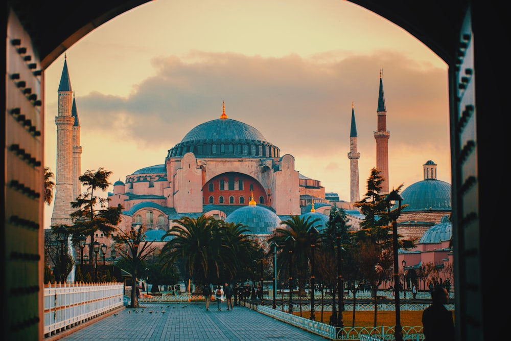 a view of a mosque through an archway