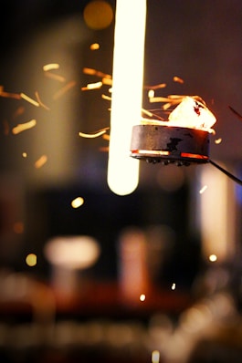 a close up of a piece of food on a stick