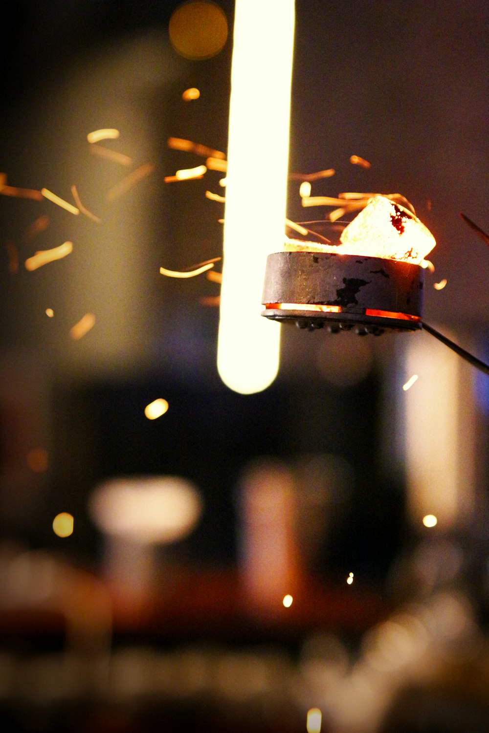 a close up of a piece of food on a stick