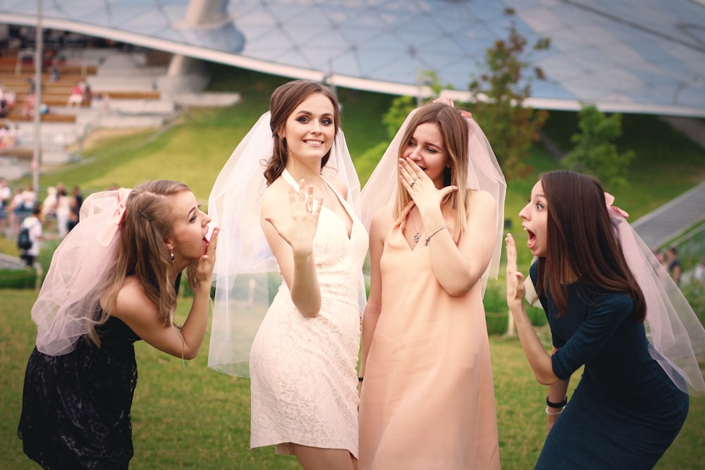 a group of young women standing next to each other