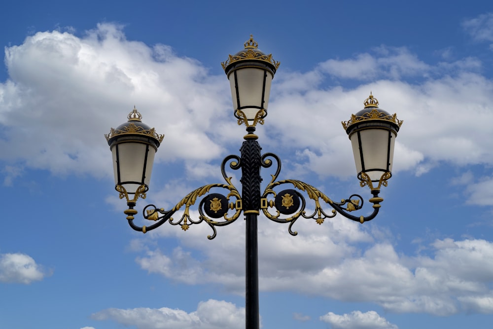 a street light with a sky in the background