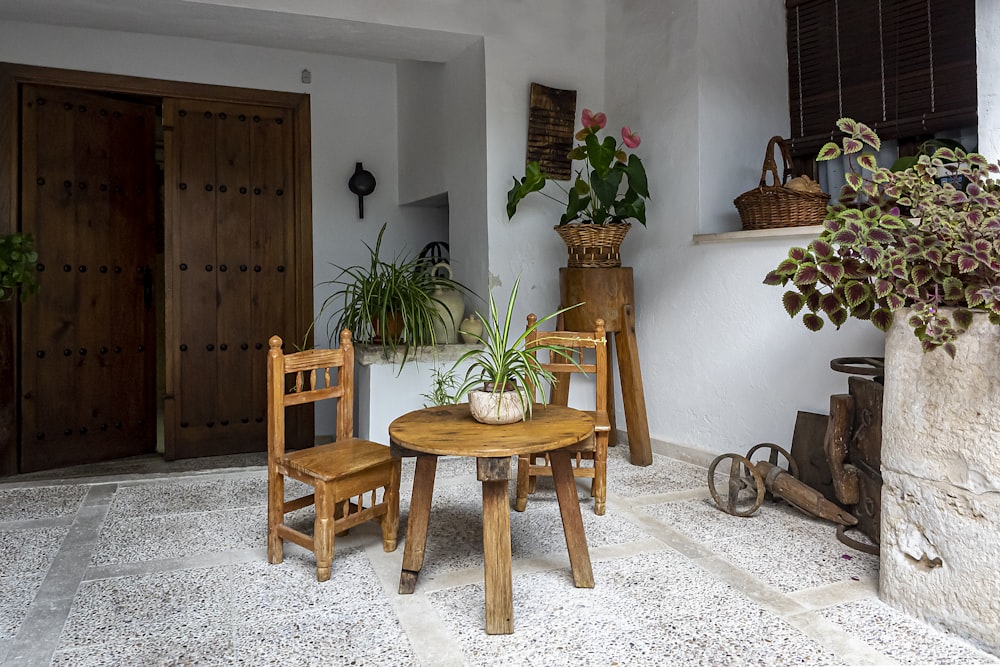 a small table and two chairs in a room