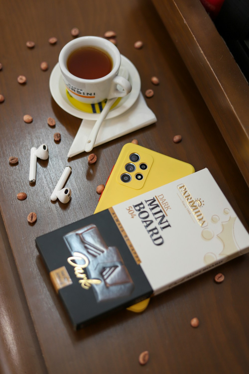 a cup of tea and a book on a table