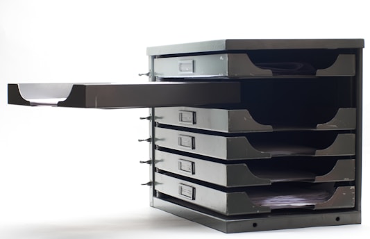 a stack of drawers sitting on top of each other