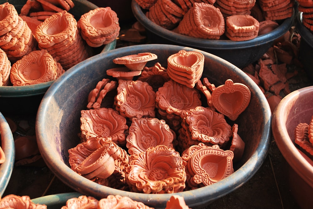 a bowl filled with lots of different shaped cookies