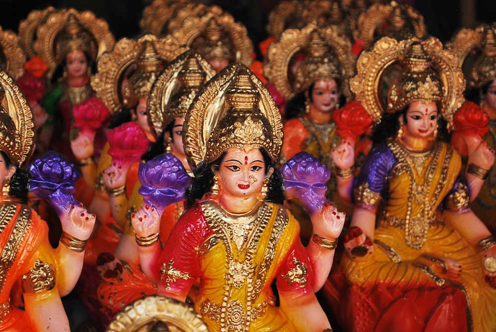 a group of women dressed in colorful costumes