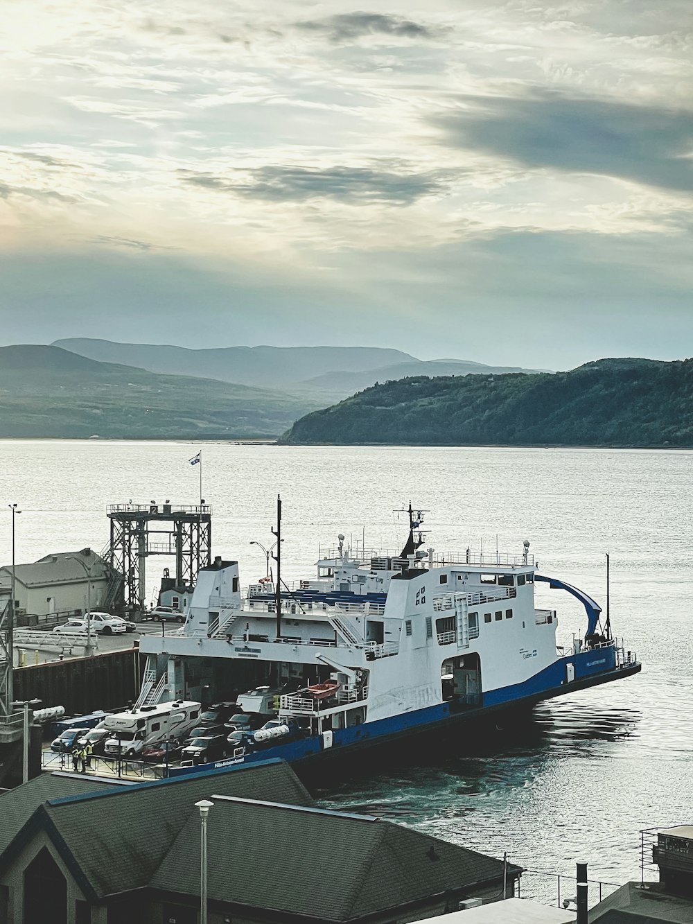 a large boat is docked at a pier