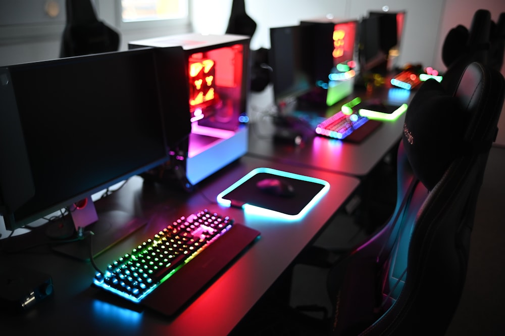 a computer desk with a keyboard, mouse and monitor