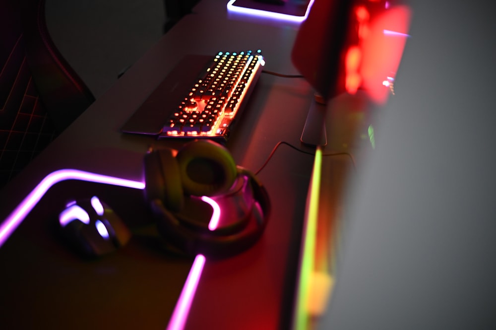 a close up of a keyboard and a mouse on a desk