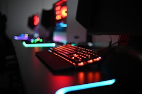 a computer keyboard sitting on top of a desk