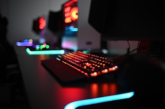 a computer keyboard sitting on top of a desk