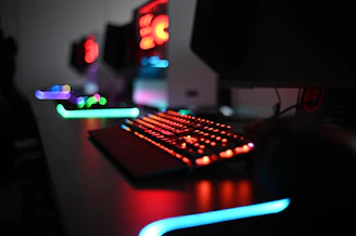 a computer keyboard sitting on top of a desk