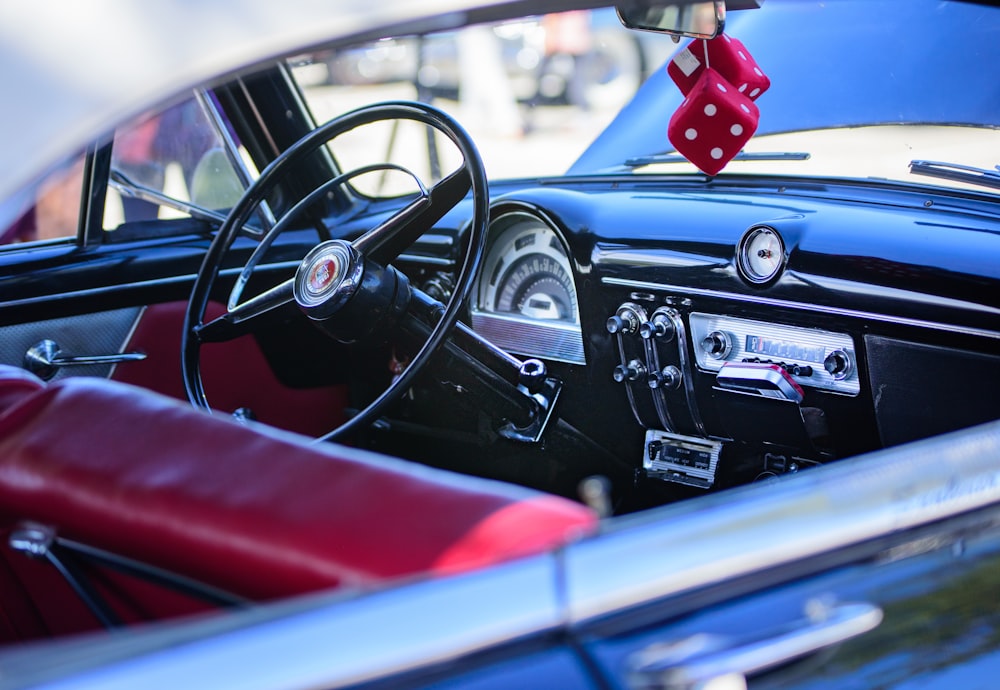 a close up of a car dashboard with a steering wheel