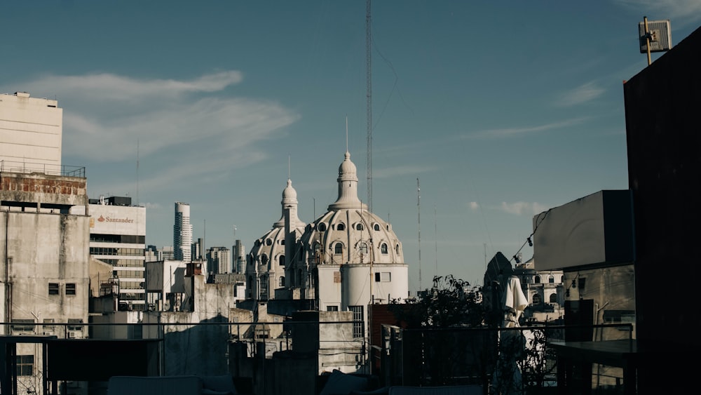 a view of a city skyline from a rooftop