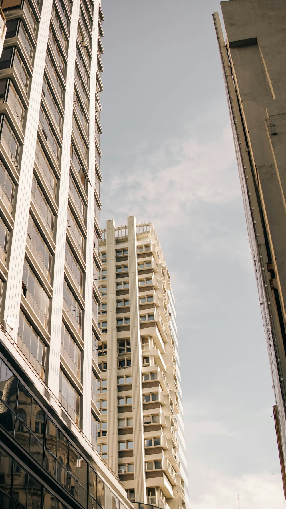 a tall building next to another tall building